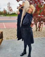 Хаки Зимняя куртка с натуральным мехом и водонепроницаемым материалом.