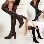 Melns Zābaki Virs Ceļgala Ar Masīvu Papēdi